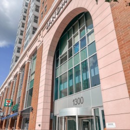 the front of a building with several windows