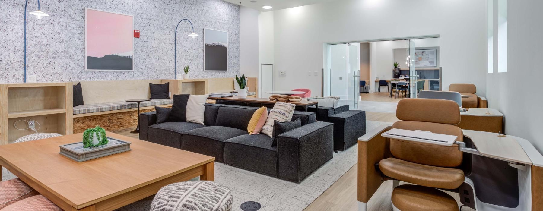 a living room with a couch and a table